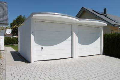 Doppelgaragen mit rundem Vordach